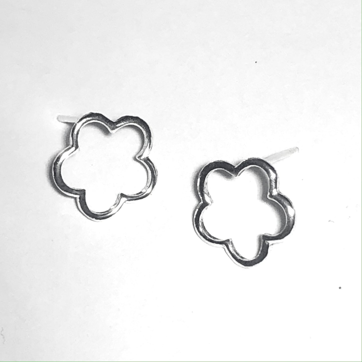 Silver flower outline studs (large)