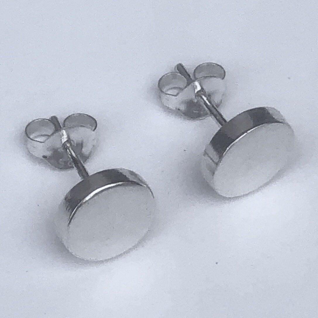 Raised circle silver studs