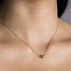Golden orb necklace